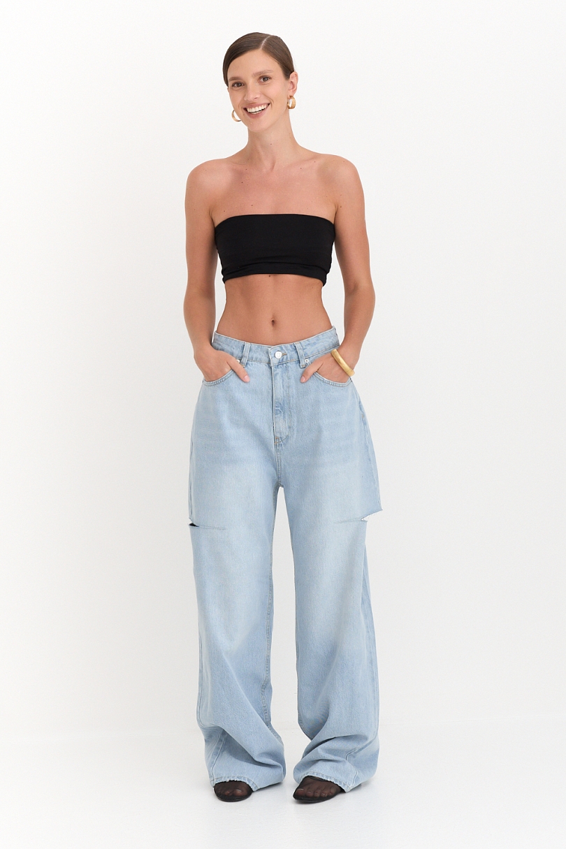 Джинсы с разрезами широкого кроя